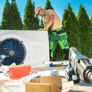 a pool guy is installing a swimming pool equipments for luxpool